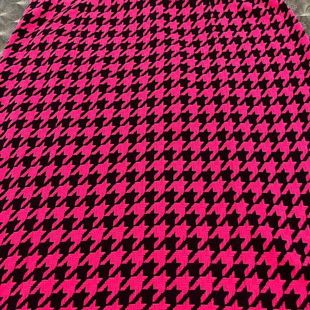 Woman’s pink and black skirt size 10